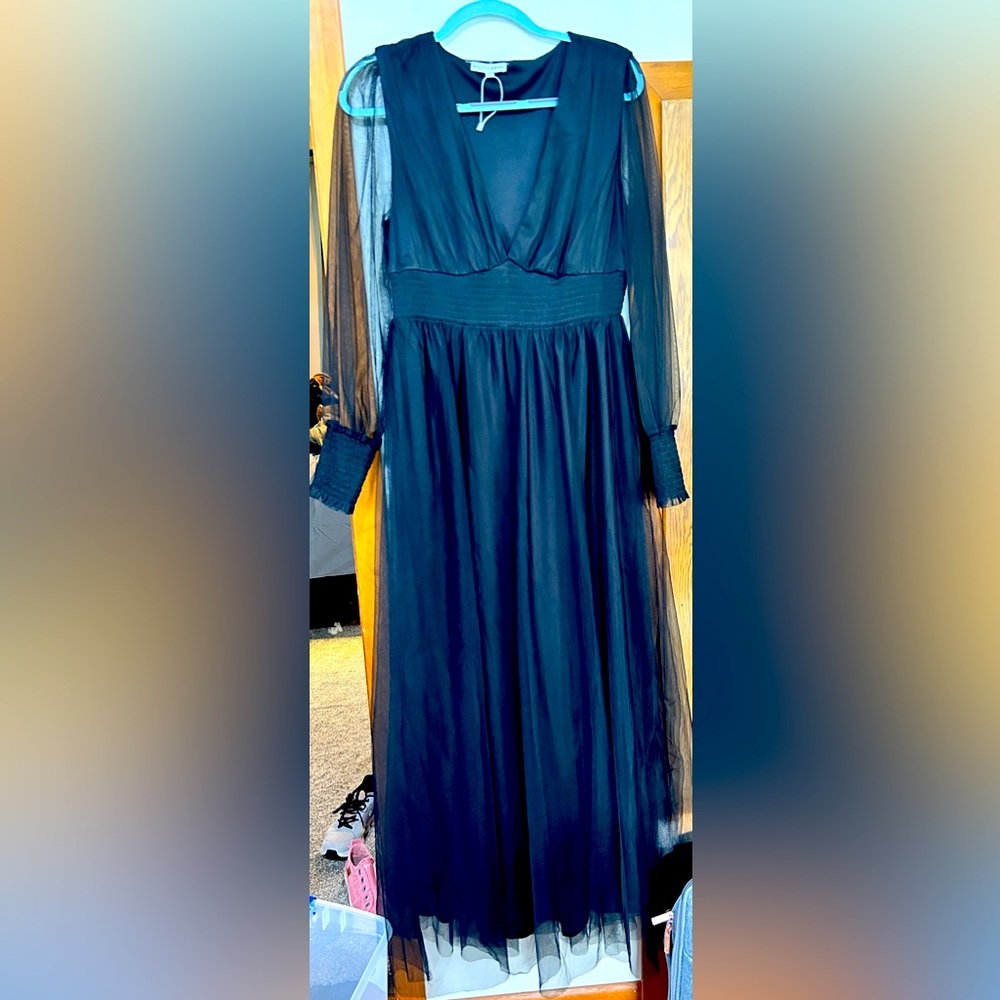 Women’s floor length black gown